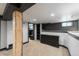 Finished basement bedroom with gray trim and modern decor accents at 915 N Kearney St, Denver, CO 80220