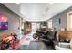 Finished garage space with gray walls, accent wood paneling, and red, gray, and black checkered floor at 915 N Kearney St, Denver, CO 80220