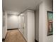 Hallway with full-length storage closet providing functional storage and organization at 915 N Kearney St, Denver, CO 80220