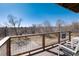 Balcony features an open view of the neighborhood and cozy outdoor seating at 6240 Everett Ct # B, Arvada, CO 80004