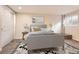 Serene bedroom with a plush bed, soft lighting, and neutral tones, perfect for relaxation and restful nights at 805 Northridge Rd, Highlands Ranch, CO 80126