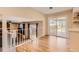 Upstairs landing with view of the backyard and lower-level living spaces at 805 Northridge Rd, Highlands Ranch, CO 80126