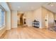 Bright living room featuring hardwood floors, recessed lighting, and an open floor plan with easy access to other areas at 805 Northridge Rd, Highlands Ranch, CO 80126