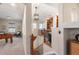 Open loft area with built-in shelving and game area at 7777 E 23Rd Ave # 1405, Denver, CO 80238