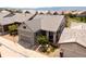 Aerial view showcases this home's attractive exterior and landscaping in a desirable neighborhood at 997 Brocade Dr, Highlands Ranch, CO 80126