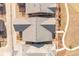 Birds-eye view of homes with gray tiled roofs in a well-manicured community at 997 Brocade Dr, Highlands Ranch, CO 80126