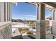 Stone pillars and walkway leading to house with mountain views at 997 Brocade Dr, Highlands Ranch, CO 80126