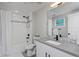 Modern bathroom featuring sleek fixtures, a shower-tub combination with stylish tiling, and a bright vanity at 2729 W 28Th Ave # 302, Denver, CO 80211