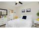 Inviting bedroom featuring a cozy bed, stylish decor, and ample natural light for a comfortable retreat at 2729 W 28Th Ave # 302, Denver, CO 80211