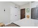 Inviting entryway featuring coat closet, wood flooring, and modern finishes at 2729 W 28Th Ave # 302, Denver, CO 80211