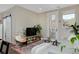 Inviting living room area with ample natural light, neutral tones, and a decorative rug at 2729 W 28Th Ave # 302, Denver, CO 80211