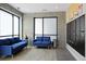 Comfortable lobby with modern furnishings and concrete accent wall at 2729 W 28Th Ave # 302, Denver, CO 80211