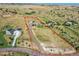 Wide aerial shot showcases the expansive property, surrounding landscape and neighborhood at 2351 Sagebrush St, Parker, CO 80138