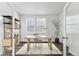 Home office with built-in shelving, desk and chair at 2025 Barnwood Dr, Brighton, CO 80601