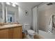 Bathroom with neutral color palette, toilet, and shower/tub combo at 9771 Mayfair St # F, Englewood, CO 80112