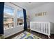 Bright Bedroom featuring an area rug and lots of natural light at 9771 Mayfair St # F, Englewood, CO 80112