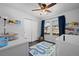 Bright Bedroom with an area rug, natural light, and closet at 9771 Mayfair St # F, Englewood, CO 80112