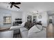 Spacious living area flowing into the dining area, with lots of natural light at 9771 Mayfair St # F, Englewood, CO 80112