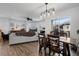 Spacious living room with a dining area and a comfortable sofa for relaxation at 9771 Mayfair St # F, Englewood, CO 80112