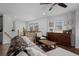 Bright open-concept living area with stairs and contemporary decor at 9771 Mayfair St # F, Englewood, CO 80112