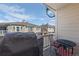 Patio with a seating area, barbecue grill and view of homes at 9771 Mayfair St # F, Englewood, CO 80112