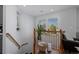 Bright staircase landing with natural light and a cozy atmosphere at 9771 Mayfair St # F, Englewood, CO 80112