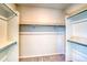 Walk-in closet with built-in shelving, offering ample storage space at 23970 E 41St Ave, Aurora, CO 80019
