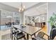 Inviting dining area with modern chairs and easy access to the outdoor patio at 82 Oneida St, Denver, CO 80230