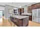 Spacious kitchen with granite countertops and stainless steel appliances at 82 Oneida St, Denver, CO 80230