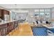 Open-concept floorplan seamlessly connects the kitchen, dining, and living areas at 82 Oneida St, Denver, CO 80230