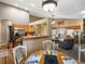 Spacious open-concept dining area and kitchen that is perfect for entertaining at 8240 Clayton Ct, Denver, CO 80229