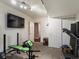 Basement exercise room equipped with treadmill, weight bench, and white paint at 8240 Clayton Ct, Denver, CO 80229