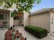 Charming home exterior with tidy front yard, planters, and covered front porch at 8240 Clayton Ct, Denver, CO 80229