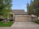 Charming single-Gathering home with well-maintained landscaping and attached two-car garage at 8240 Clayton Ct, Denver, CO 80229