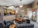 Comfortable living space with contemporary furnishings and an open connection to the kitchen at 8240 Clayton Ct, Denver, CO 80229