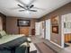 A view of main bedroom leading into the bathroom with nice neutral carpet and fixtures at 8240 Clayton Ct, Denver, CO 80229