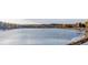 Panoramic view of the tranquil lake at 2055 Quail Dr, Lakewood, CO 80215