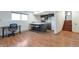 Basement area with dining table, office, and stairs at 2055 Quail Dr, Lakewood, CO 80215