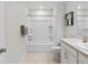 Bathroom with tub-shower, tiled floors, and a modern vanity at 2591 Iola St, Aurora, CO 80010