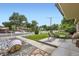 Inviting front yard with seating area offering picturesque views of the neighborhood at 6995 W 27Th Ave, Wheat Ridge, CO 80033