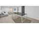 Finished basement with modern gray decor, featuring a ping pong table for recreation at 169 Yates St, Denver, CO 80219