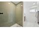 Modern bathroom featuring a tiled shower and vanity at 169 Yates St, Denver, CO 80219