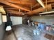 Detached garage view featuring the garage door, and spacious interior with storage at 169 Yates St, Denver, CO 80219