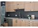 Close-up of modern kitchen showcasing sleek counters, cabinetry, and stainless steel appliances at 512 Cook St, Denver, CO 80206