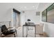 Bright office space with a desk, chairs, and a sliding glass door at 512 Cook St, Denver, CO 80206