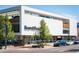 Modern 'Room & Board' furniture store featuring a clean, white exterior with large windows at 512 Cook St, Denver, CO 80206