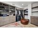 Spacious walk-in closet with custom shelving and ample storage space at 512 Cook St, Denver, CO 80206