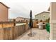 Outdoor patio space with fence and grill at 21302 E Radcliff Pl, Aurora, CO 80015