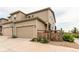 Charming two-story home with a two car garage and a wooden fence at 21302 E Radcliff Pl, Aurora, CO 80015