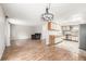 Inviting living space adjacent to the kitchen, offering seamless entertaining and relaxed living at 10723 Sperry St, Northglenn, CO 80234